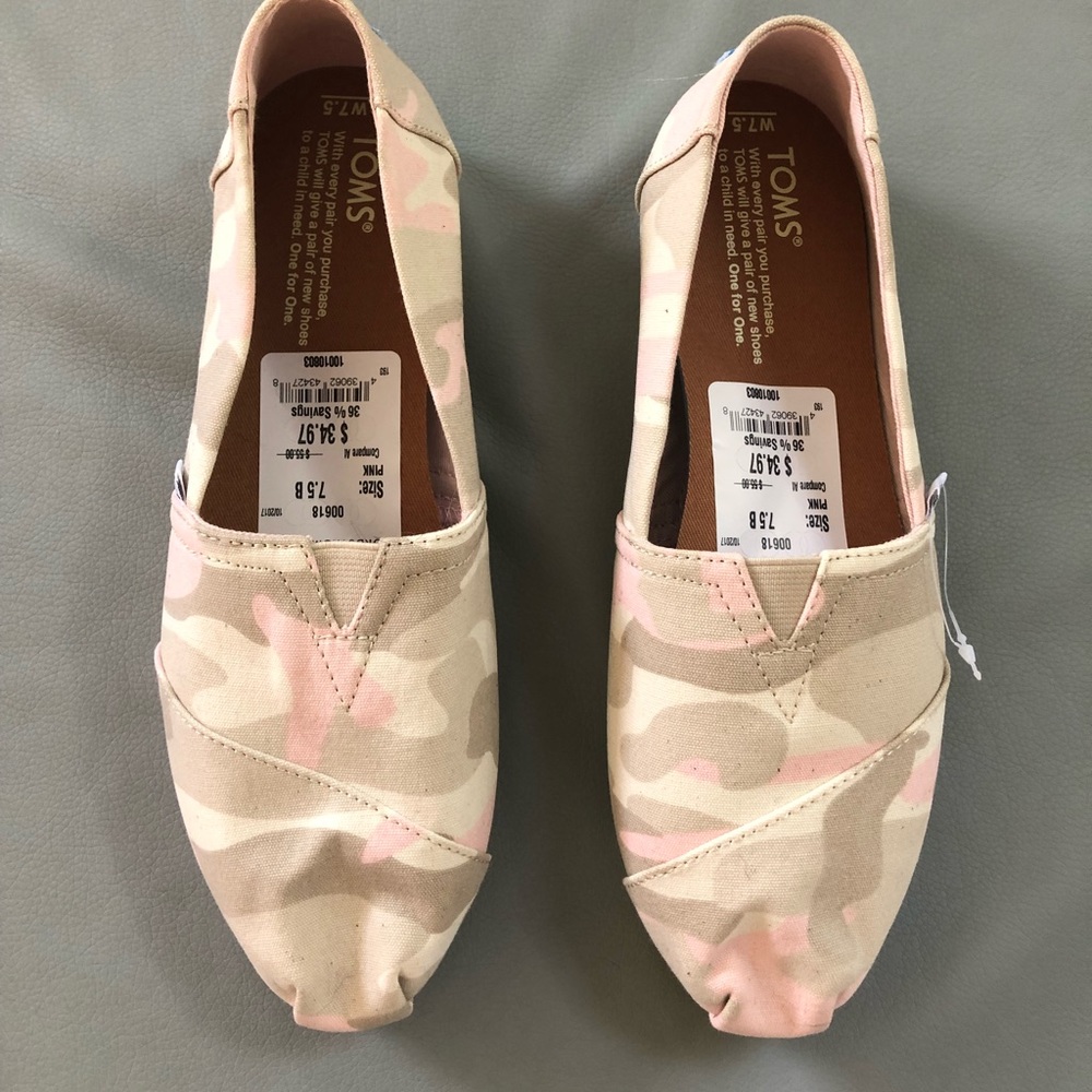 Never worn, tags on! Pink and beige camo Toms.